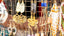 Jewelry display with various earrings and necklaces.