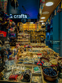 Colorful handmade crafts and souvenirs displayed in a market stall