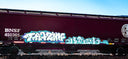 Graffiti art on a maroon train car