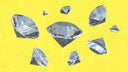 Several diamonds scattered on a yellow background