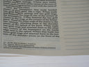 Close-up of text in an open book.
