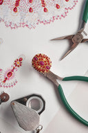 Jewelry design with tools and sketches