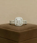 A diamond ring set sits on a display box.