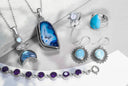 Blue agate pendant with silver-toned twisted wire border and chain in birthstone jewelry and art gold jewelry trends.