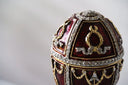 Fabergé egg royal jewel in 18k gold and red enamel with diamonds