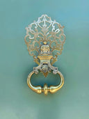 Ornate brass door knocker in lost royal jewels art gold jewelry