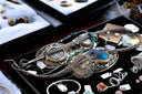 Silver filigree pendant with hidden jewelry compartment and turquoise accents