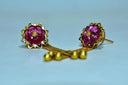 Delicate 18k gold earrings with pink floral gemstones and dangling chains
