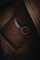 Silver spiral keychain with engraved ring, stunning 18k gold art jewelry.