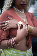 Stunning 18k gold watch with textured bezel on wrist, 2025 trend