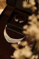 Elegant jewelry set displayed in an open box.