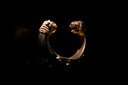 Gold dragon head ring in art gold jewelry with intricate scales and claws