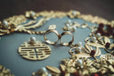Timeless art gold jewelry: interlocking wedding bands with pearls