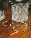 Gold-toned figaro chain necklace with interlocking links showcasing fine 18k gold jewelry for elegant style trends