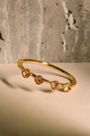 Stunning custom gold jewelry art: 18k gold bangle with amber stones