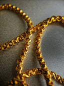 Shiny 18k unique gold chain with interlocking links in art gold jewelry