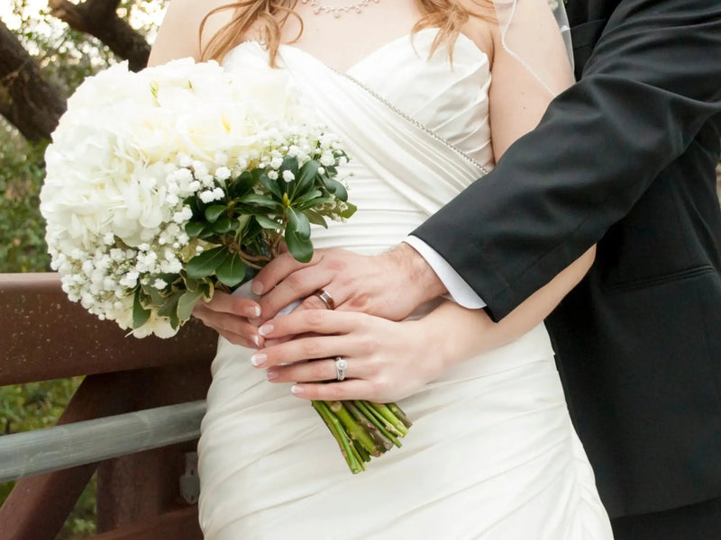 Luxury white wedding bouquet with hydrangeas, baby’s breath, above $1000