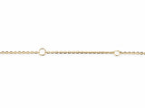 Close view of the fine yellow gold cable chain with the two larger fixed rings used to shorten the necklace to 17 and 16 inches