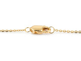 The lobster claw clasp of the station necklace, its polished gold body and the small hallmark stamp on the lower edge