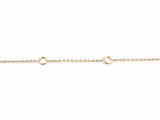 Close view of the fine yellow gold cable chain with the two larger fixed rings used to shorten the necklace to 17 and 16 inches