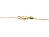 The lobster claw clasp of the clover necklace, closed on its ring, with the 585 gold mark stamped on the ring beside the clasp