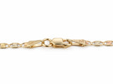 Lobster claw clasp with two flat end tags stamped 14K on the piastrine chain