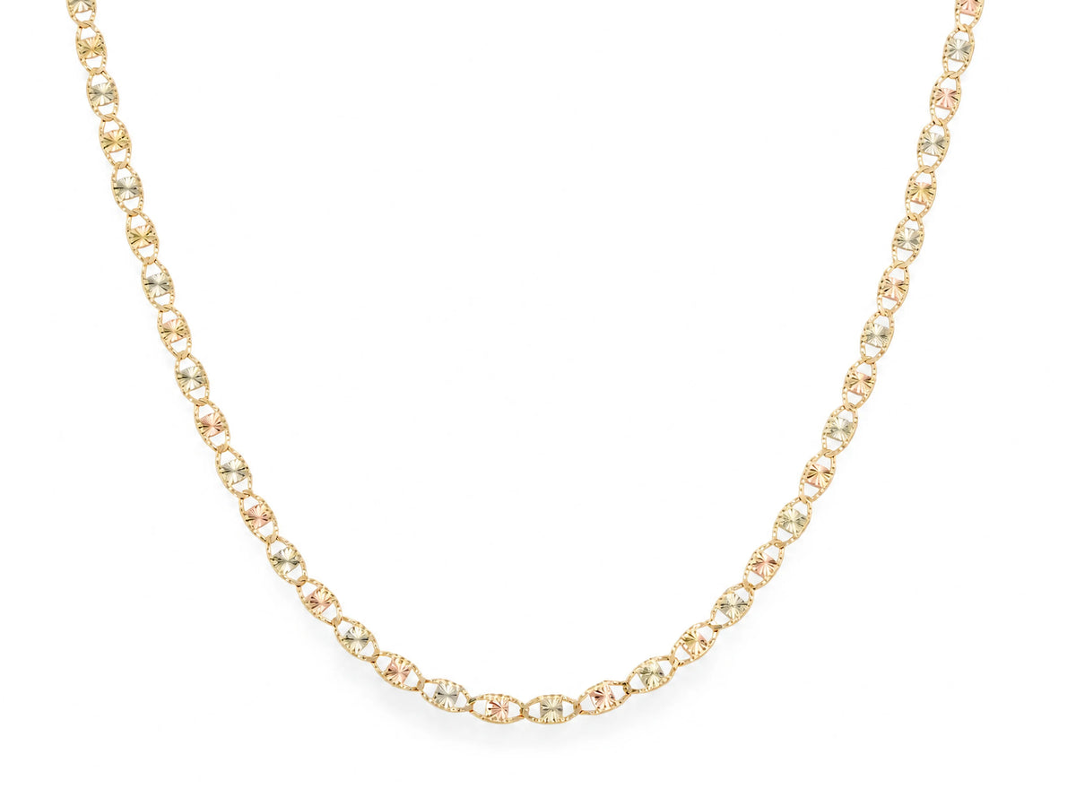 14K gold piastrine chain laid in a U shape on white, openwork plate links with diamond-cut starburst centres