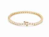 14K yellow gold tennis bracelet closed in an oval with the box clasp at the front, a single continuous row of round lab grown diamonds