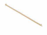 Tennis bracelet laid open, the box clasp and its safety latch visible at one end