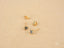 Gold stud earrings with blue CZ stones from Celestial Spark, certified 18K solid gold jewelry