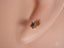 Gold star stud earring from Celestial Spark, featuring certified 18K solid gold and blue CZ
