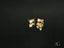 Elegant 18K Gold Pearl Stud Earrings featuring a gold rabbit design in art gold jewelry