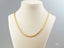 18k yellow gold braided chain necklace with lobster clasp in Italian-style art gold jewelry