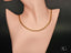 18k yellow gold braided chain necklace with lobster clasp, part of Art Gold Jewelry collection