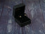 Star-shaped stud earrings in a black jewelry box from the Celestial Sparkle collection