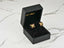 Butterfly earrings in a black jewelry box featuring 18K gold multicolor CZ design