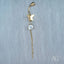 18k Gold Bellybutton Piercing with Cubic Zirconia Butterfly on Grey Background