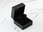 Black jewelry box displays Luminous Spark 18k Gold CZ Stud Earrings with pink studs