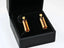 Gold earrings featuring rectangular brown gemstones and yellow accents from Solaris Legacy Collection