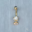 18k Gold Bellybutton Piercing with Star and Heart Cubic Zirconia Design.