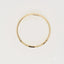 18k gold wedding band with a sleek, polished finish, symbolizing modern elegance and timeless design.