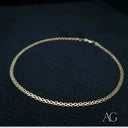 Delicate 18k gold anklet with interlocking circular links, modern jewelry