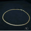 Delicate 18k gold anklet with interlocking circular links, perfect for modern jewelry enthusiasts
