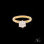 Gold engagement ring featuring a solitaire diamond in an 18k CZ solitaire design
