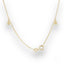 Delicate 18k gold anklet featuring small decorative elements and zirconias