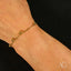 18k gold balls bracelet for kids featuring a gold chain with spherical beads