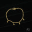 18k gold balls bracelet for kids featuring a delicate chain and dangling charm balls