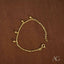 Delicate 18k gold balls bracelet for kids with small 18k gold charms and lobster clasp