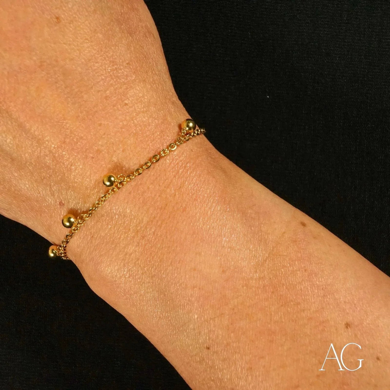 Delicate 18k gold balls bracelet for kids with small spherical beads