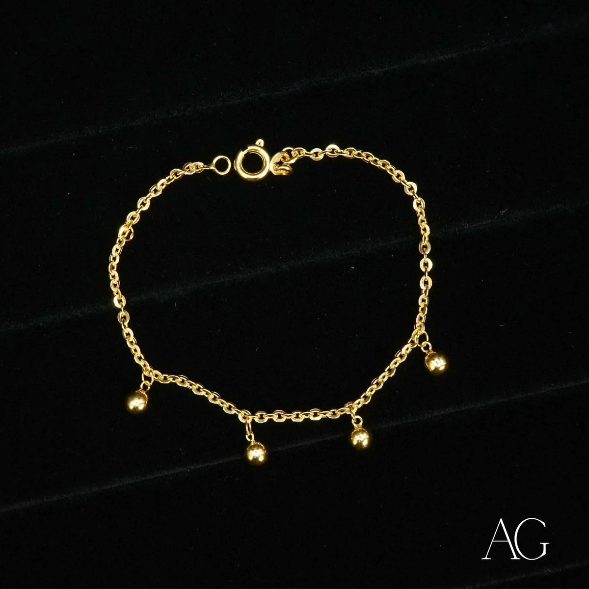 Shiny 18k gold balls bracelet for kids with dangling charms